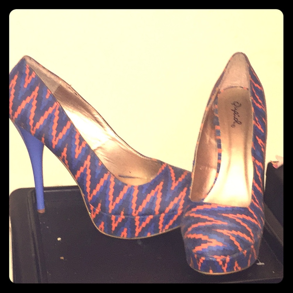 Size 10 blue and orange stripe pumps.